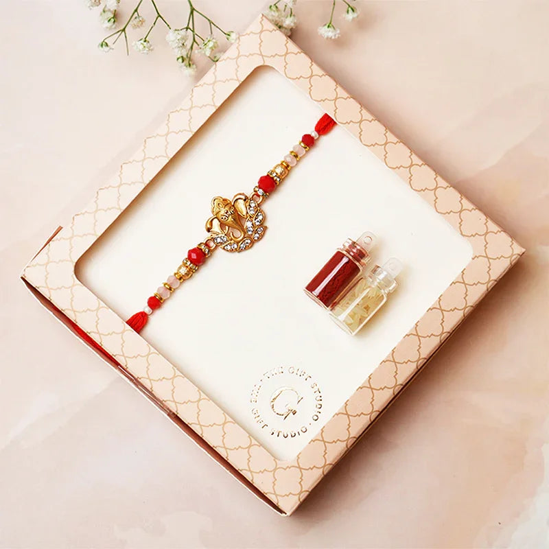 Gold Ganesha Rakhi - The Gift Studio