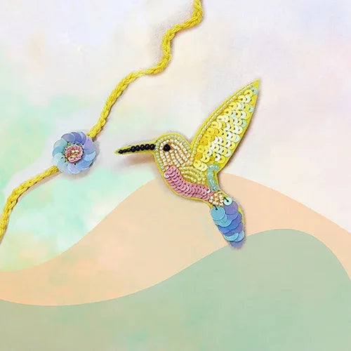 Phool Rakhi & Yellow Hummingbird Brooch - The Gift Studio