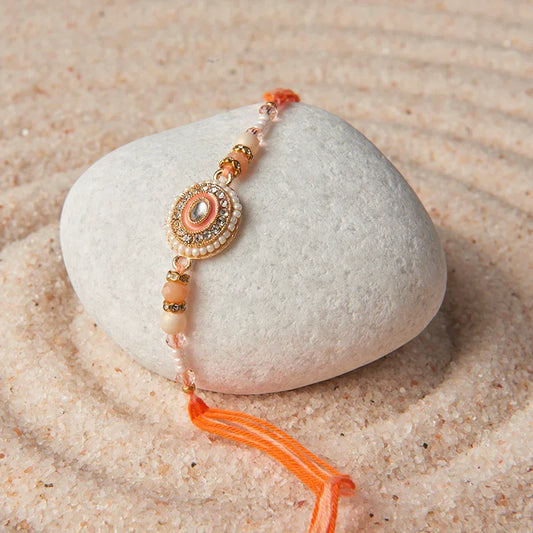 Peach Meenakari Pearl Rakhi_The Gift Studio