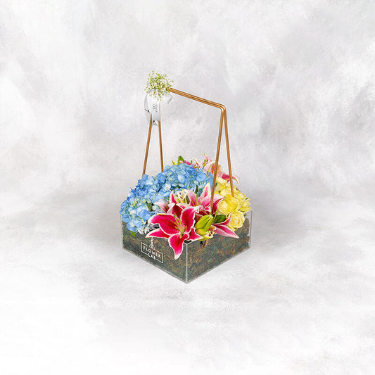 Exotic Blooms In Acrylic Basket