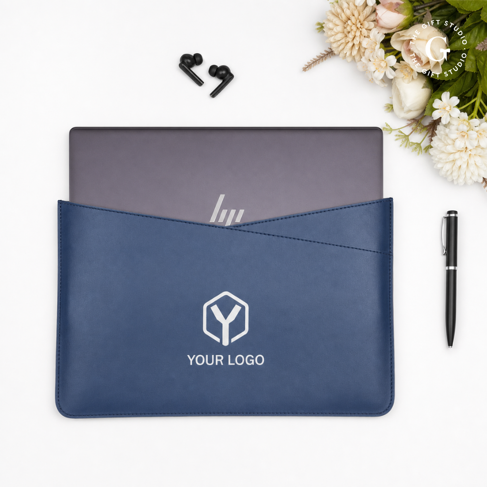 Navy blue laptop sleeve with a TGS branding logo