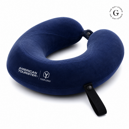 Blue travel neck pillow with American Tourister logo and TGS branding