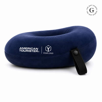 Blue travel neck pillow with American Tourister logo and TGS branding