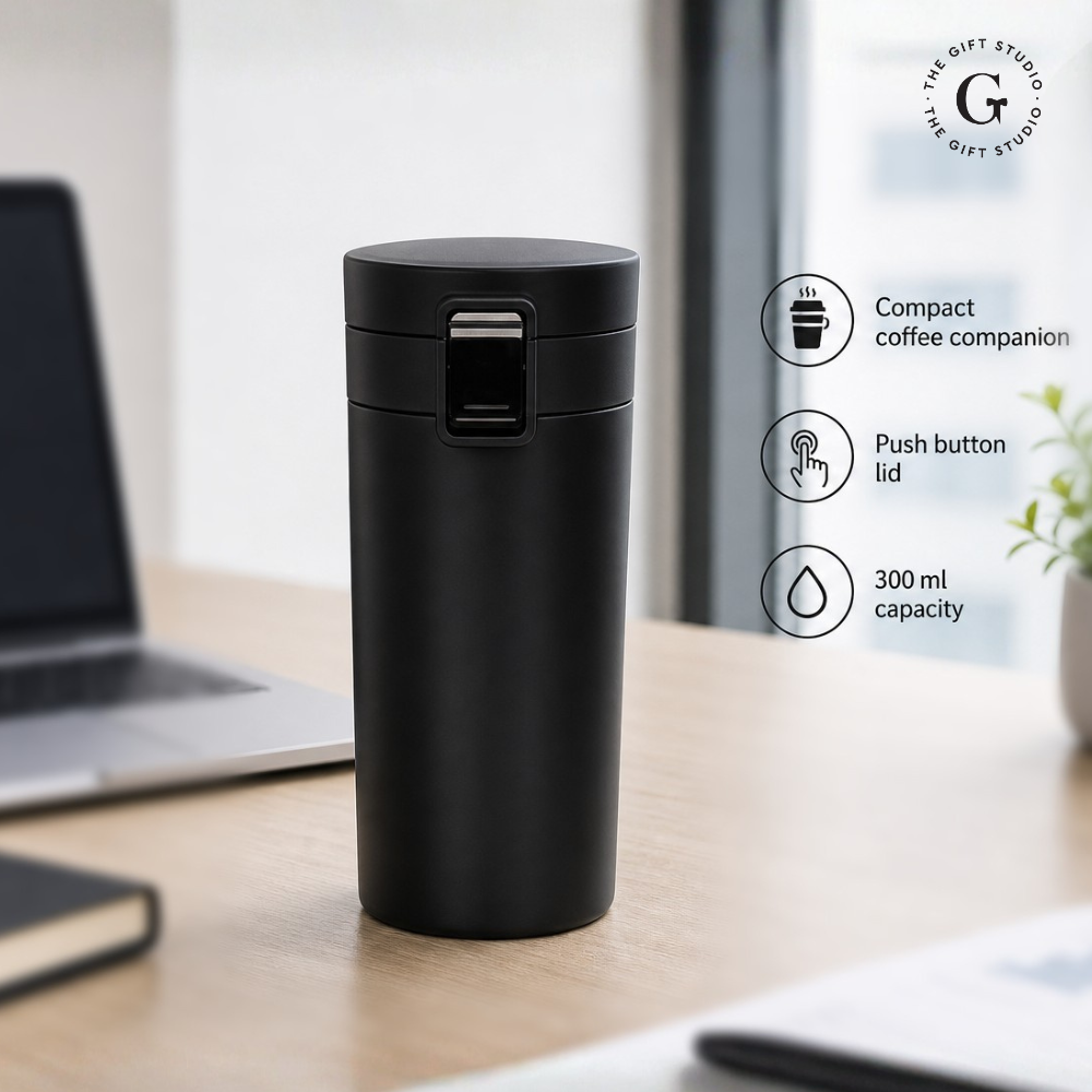 Black travel mug with TGS Branding.
