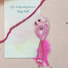 Shimmer Rakhi & Magenta Sparrow Brooch