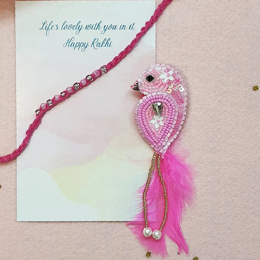 Shimmer Rakhi & Magenta Sparrow Brooch