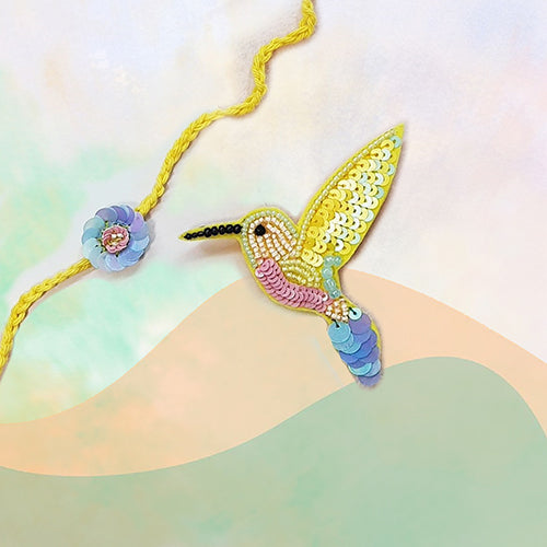 Phool Rakhi & Yellow Hummingbird Brooch