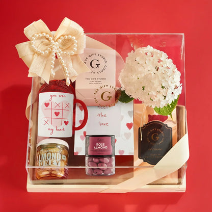 All XOXO Treats items neatly organized inside the open gift box