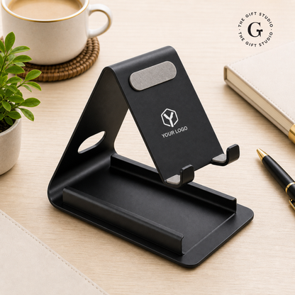 TGS Black phone stand on a desk with a card holder