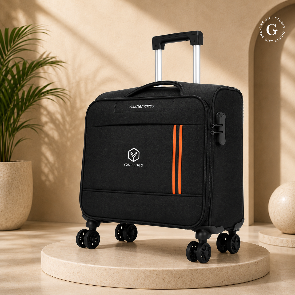 Nasher Miles branding Black suitcase with orange stripes and with TGS logo.