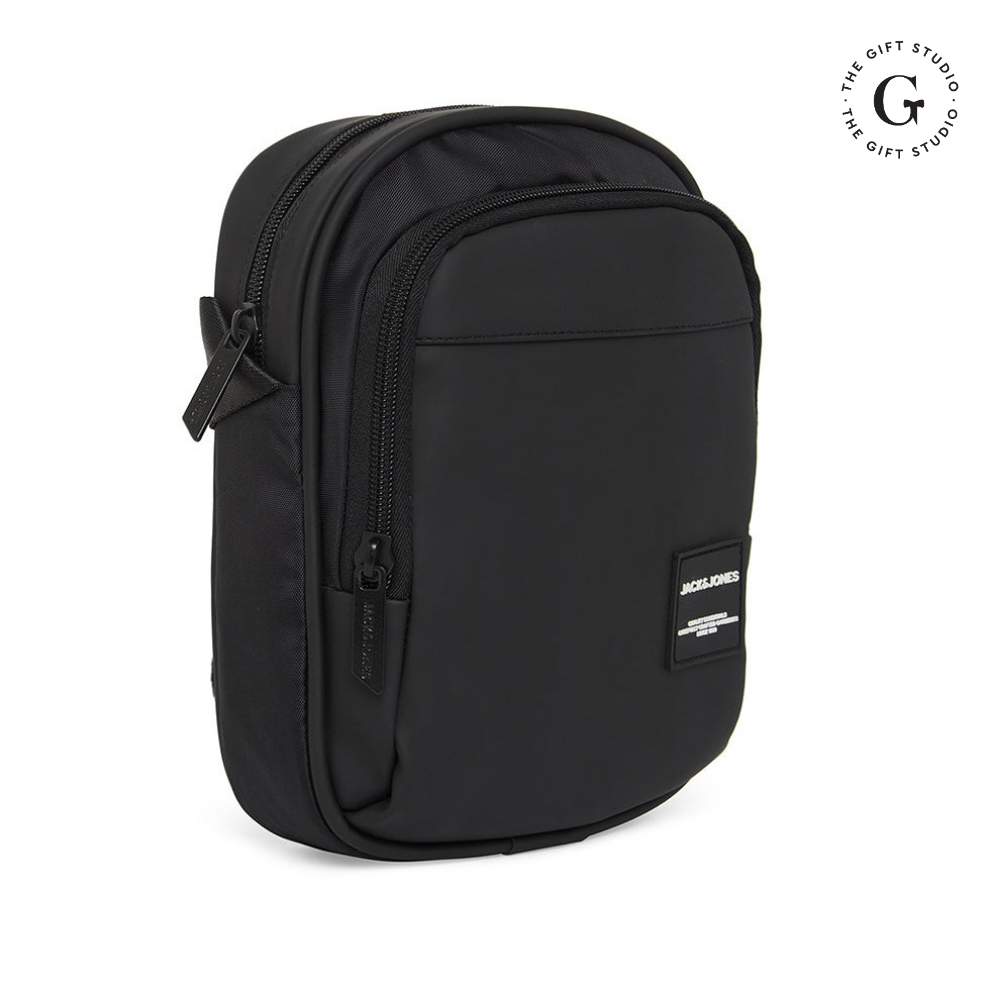 Black Sling backpack with TGS logo and Jack & Jones branding.