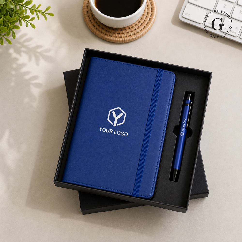 Blue notebook and pen set with a TGS Branding