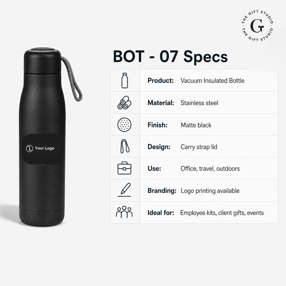 Black vacuum insulated bottle on a desk with branded 'The Gift Studio'.