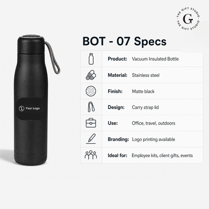 Black vacuum insulated bottle on a desk with branded 'The Gift Studio'.
