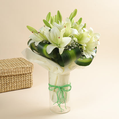 A Beautiful 6 White Asiatic Lilies in a Tied Vase