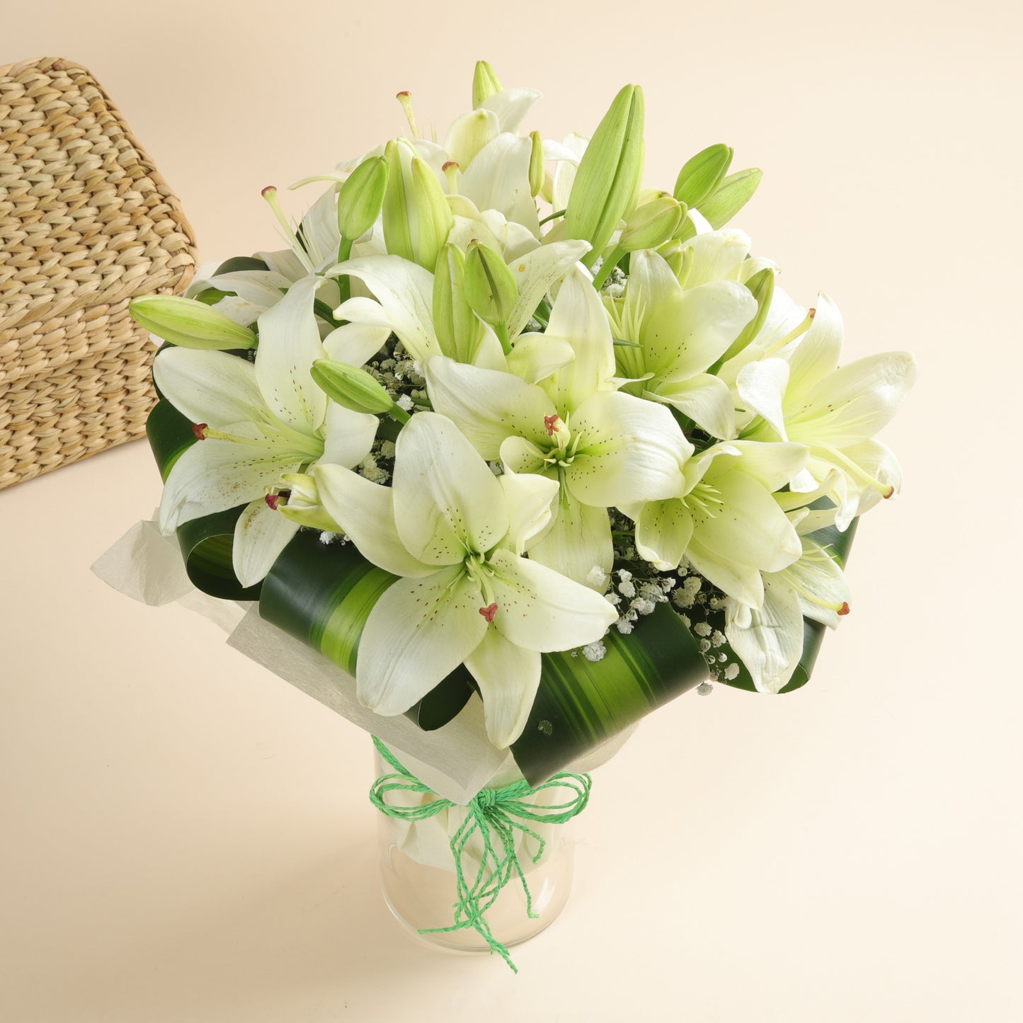A Beautiful 6 White Asiatic Lilies in a Tied Vase