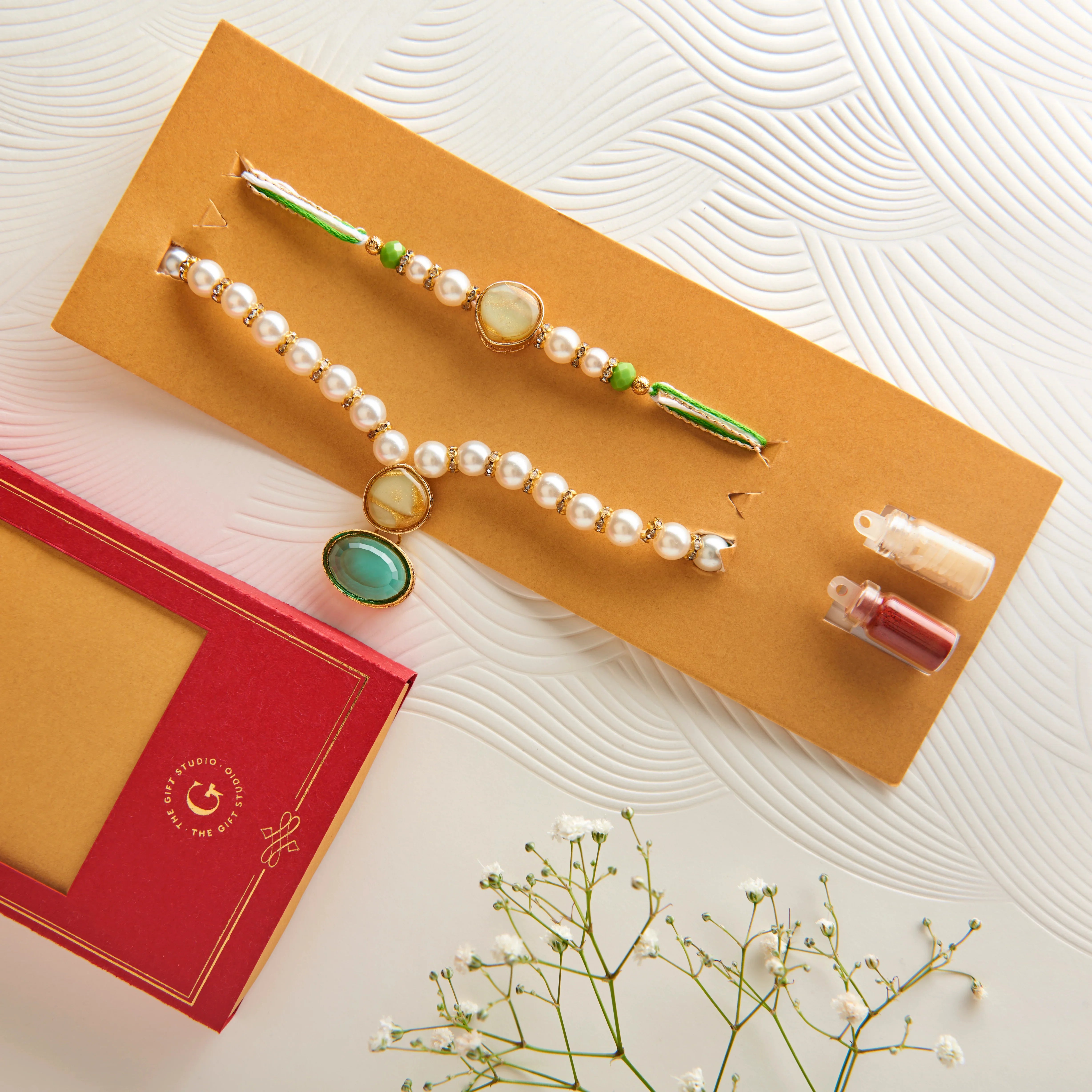 Bhaiya Bhabhi Rakhi with Pearl & Lush Green Stone