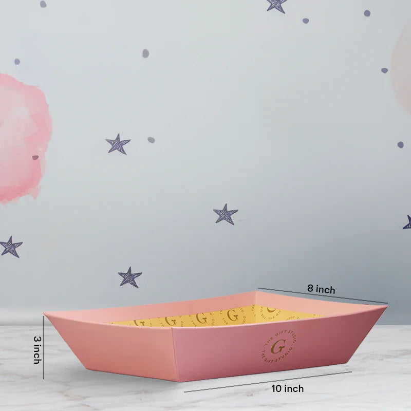 Rectangular pink and yellow gift tray, 10x8x3 inches, on a star-themed background