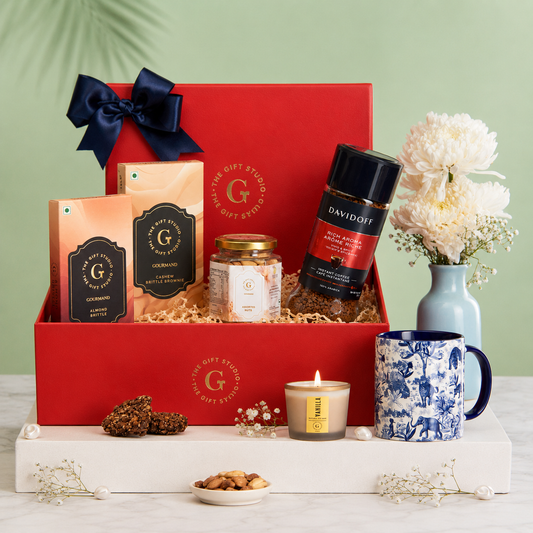items of Coffee & Crunch hamper with red gift box artfully displayed.