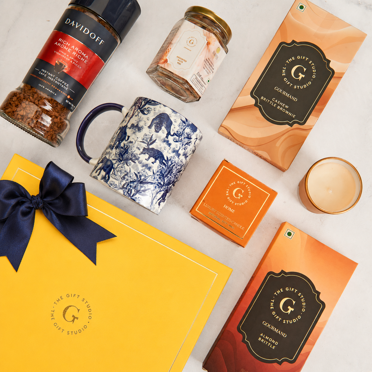 Top-down flat lay showing the full Coffee & Crunch hamper assortment.