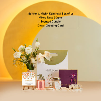 The Gift Studio Diwali Radiance Gift Bag with Kaju Katli, nuts, scented candle and flowers.