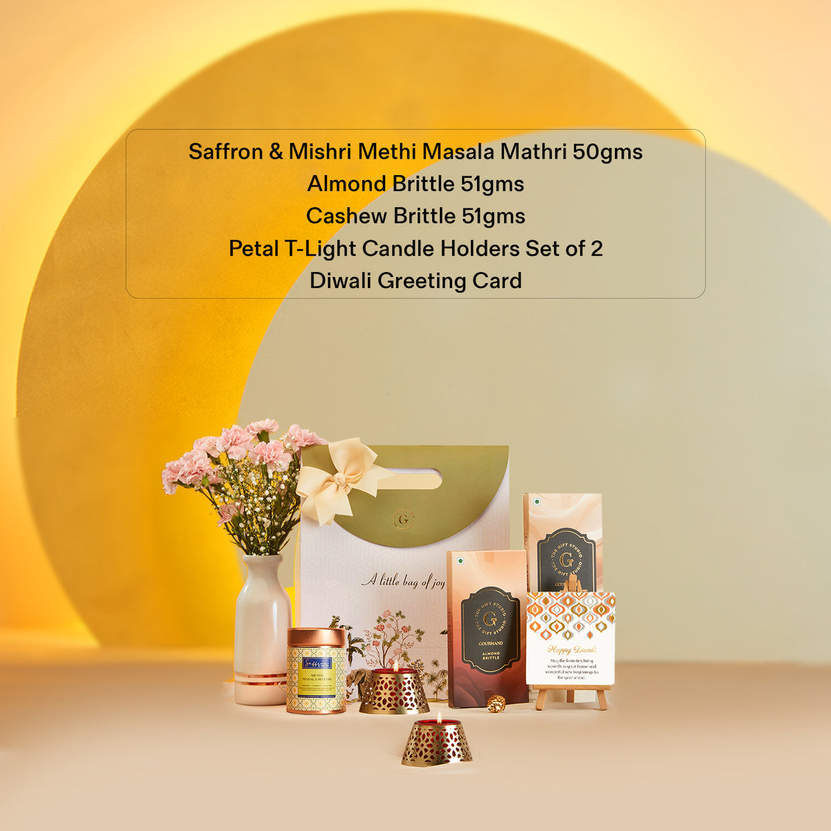 Diwali Treat Bag by The Gift Studio featuring sweets, tea light holders and a greeting card.