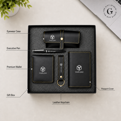 Black branded stationery set with metal pen, eyewear case, wallet, keychain and passport cover with TGS branding.