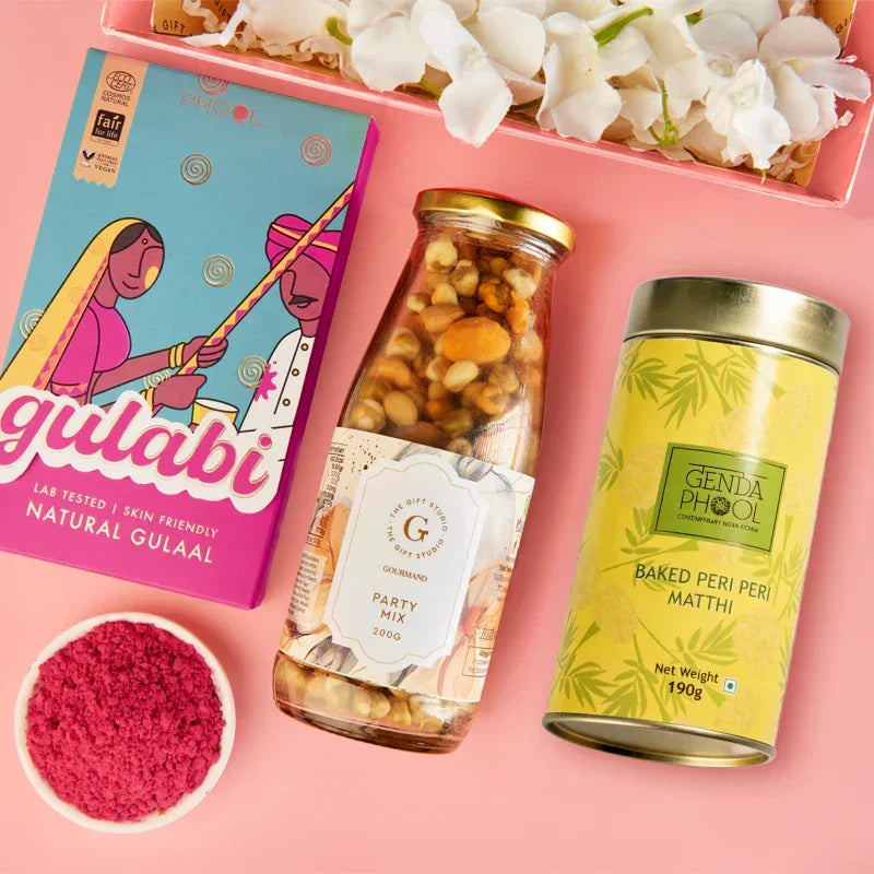 A top-down flat lay showing the full Holi Fiesta assortment.