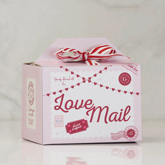 Pink Love Mail gift box with heart decorations and red striped ribbon, perfect for gifting