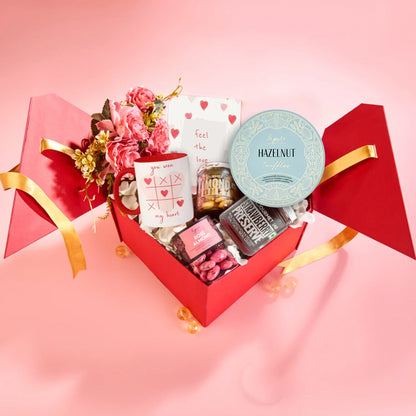 All Rosey Surprise items neatly organized inside the open gift box