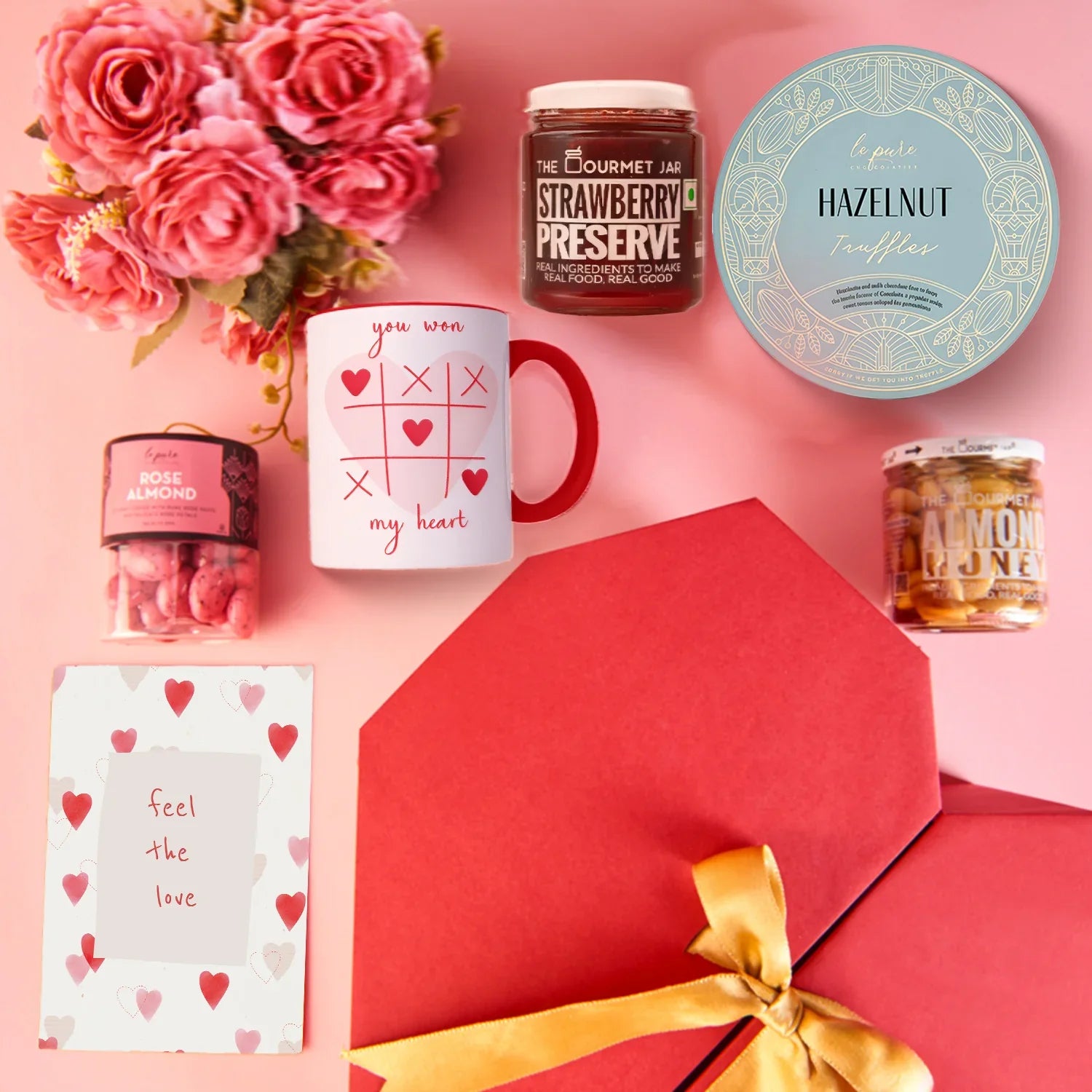 A top-down flat lay showing the full Rosey Surprise assortment.