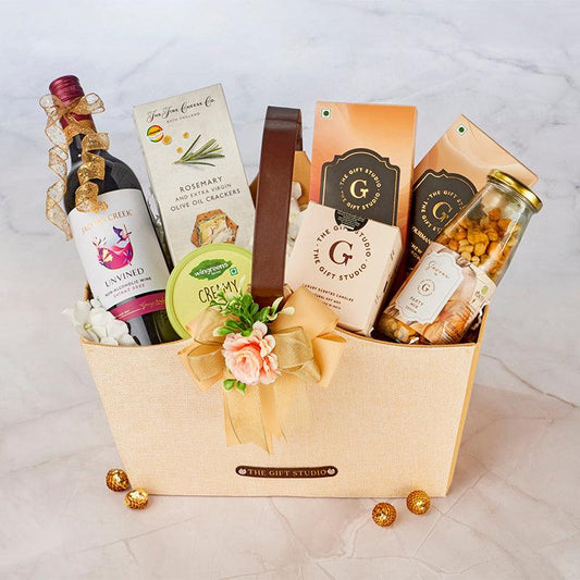 All Sunset Savories hamper items neatly organized inside the open gift box
