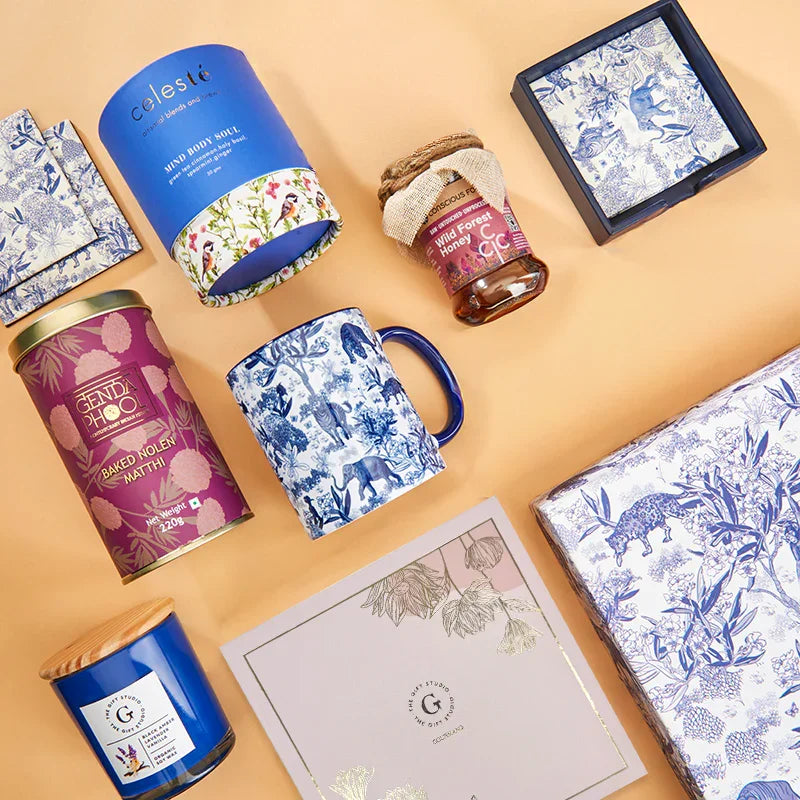 A top-down flat lay showing the full High Tea Luxury Hamper assortment.