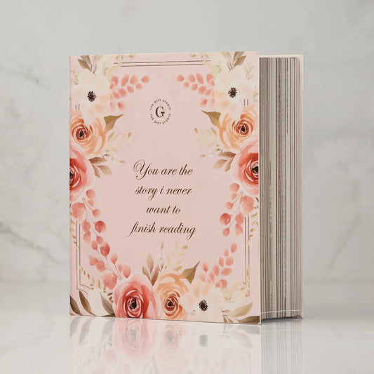 Floral pink gift box with romantic quote, ideal for gifting or special occasions