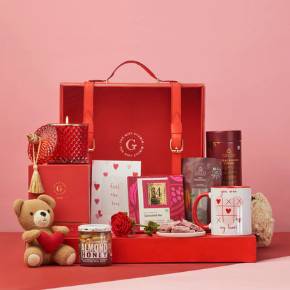 The Luxe Love Affair Hamper products artfully displayed outside the gift box.