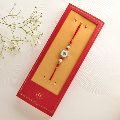 The Mother of Pearl Rakhi with CZ Embellishment