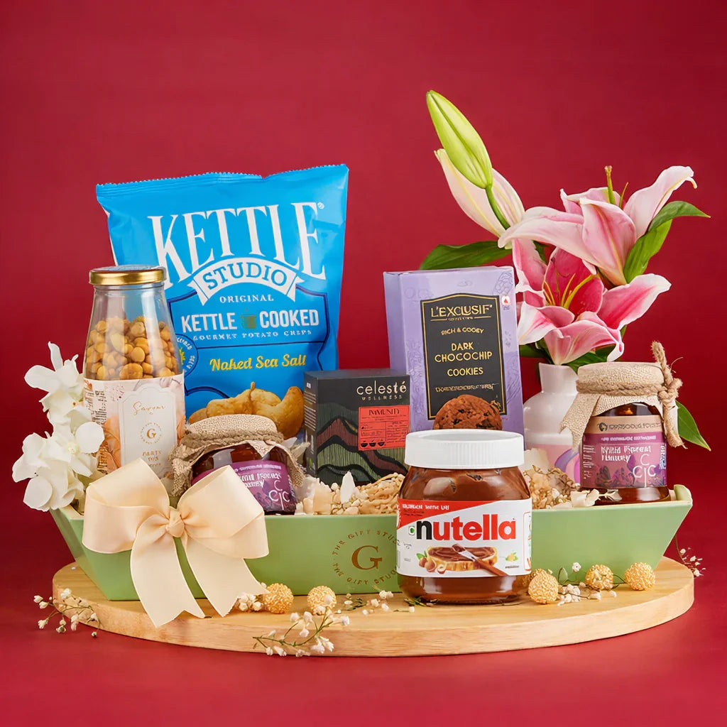 Tray of Six Senses hamper products artfully displayed outside the mint gift tray.