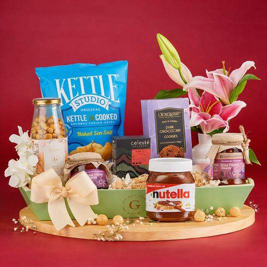 Tray of Six Senses hamper products artfully displayed outside the mint gift tray.