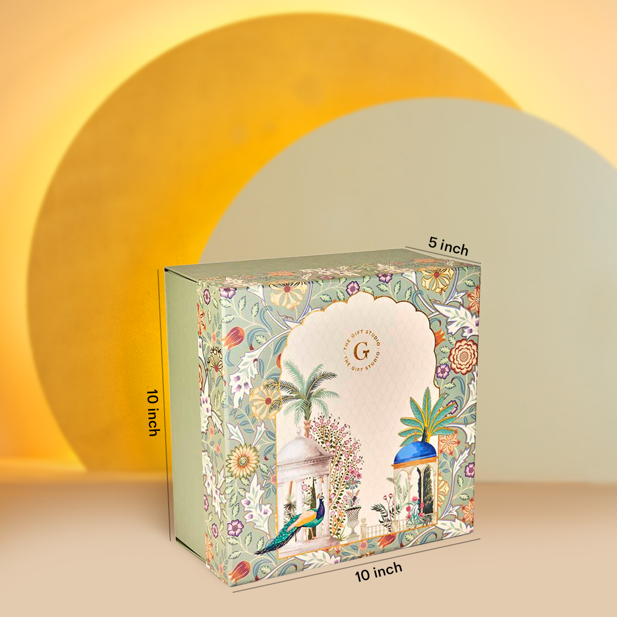 The Diwali Soirée Hamper by The Gift Studio, a 10x10x5 inch floral illustrated gift box.