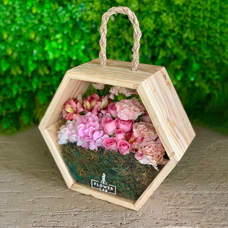 Exotic Blooms In A Wooden Bag