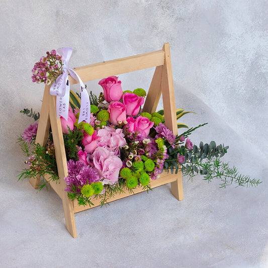 Mixed Wild Flowers In A Wooden Basket